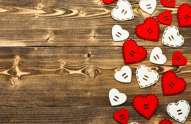 Foto decorazione cuore sfondo simbolo di amore san valentino texture con cuori da vicino attributi tradizionali di san valentino sii il mio san valentino sfondo adorabile festa di san valentino