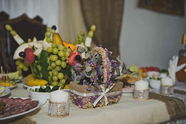 Decorations for the festive table of flowers and fruit 5014