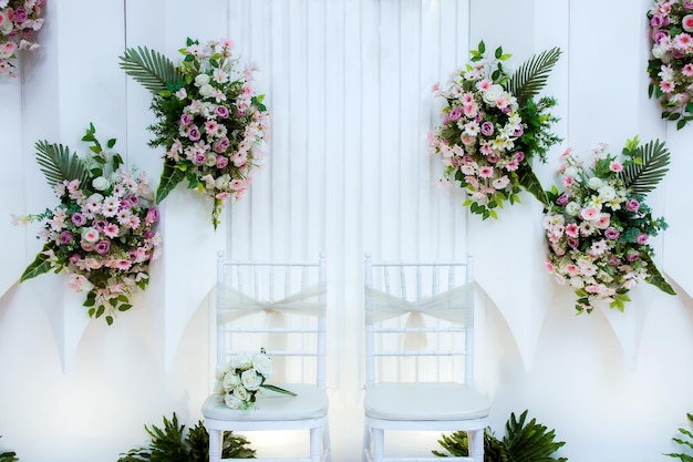 Premium Photo | Decorations, indonesia. simple but looks elegant. wedding  decorations. wedding backdrop with flowers