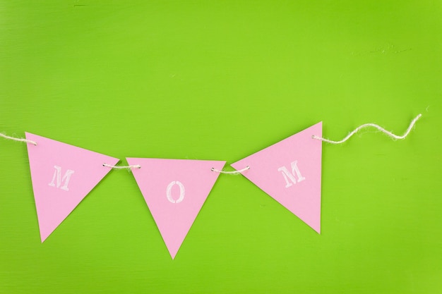 Decorations for Mother's Day on a  wood board.