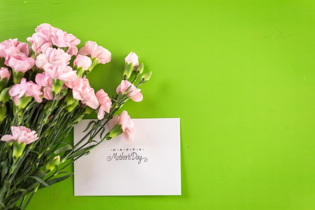 Decorations for Mother's Day on a  wood board.