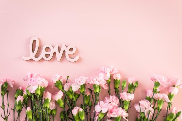 Decorations for Mother's Day on a  wood board.