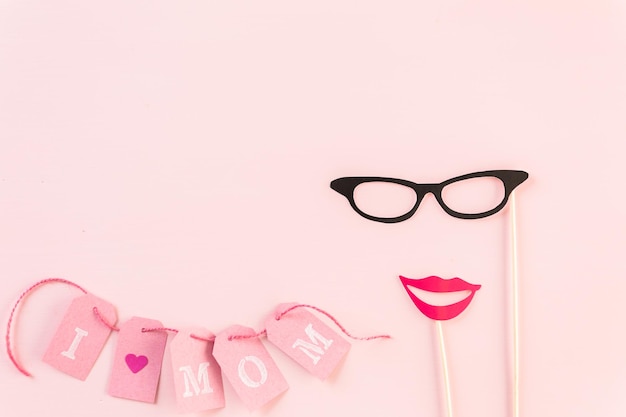 Decorations for Mother's Day on a  wood board.