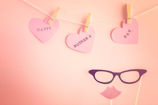 Decorations for Mother's Day on a  wood board.