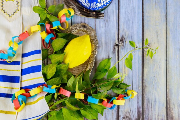 Photo decorations for sukkot on fresh citron, etrog the jewish holiday