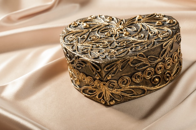 Decorative box heart shape on silk fabric