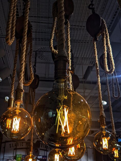 Decorative bright lamp in a cafe close up.  Electricity. Interior decoration. Illumination