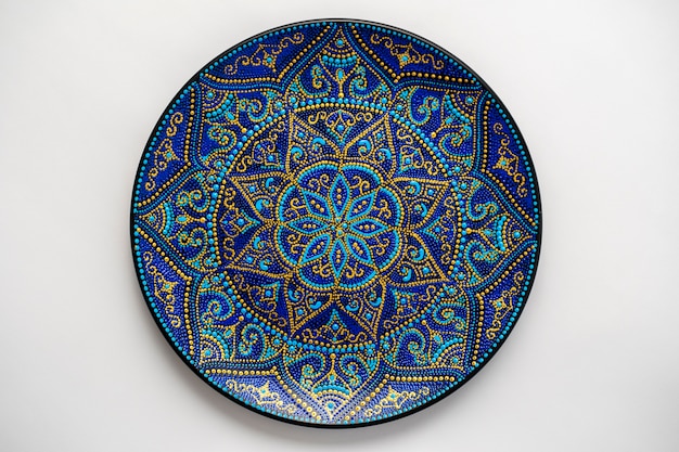 Decorative ceramic plate with black