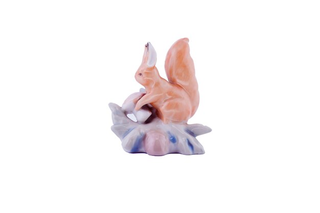 Decorative ceramic squirrel on a white background