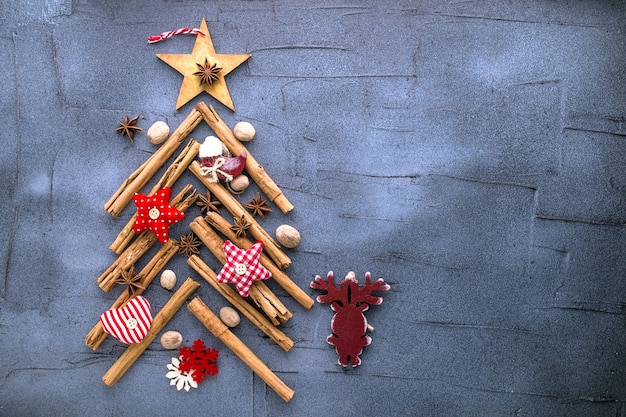 decorative Christmas tree made of cinnamon sticks and spices for mulled wine