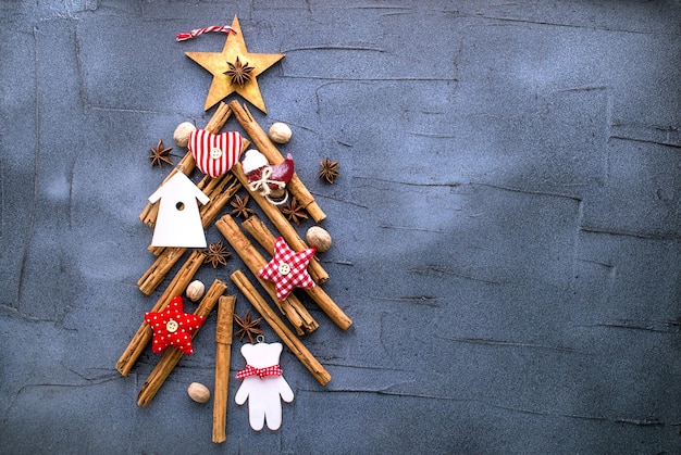 decorative Christmas tree made of cinnamon sticks and spices for mulled wine