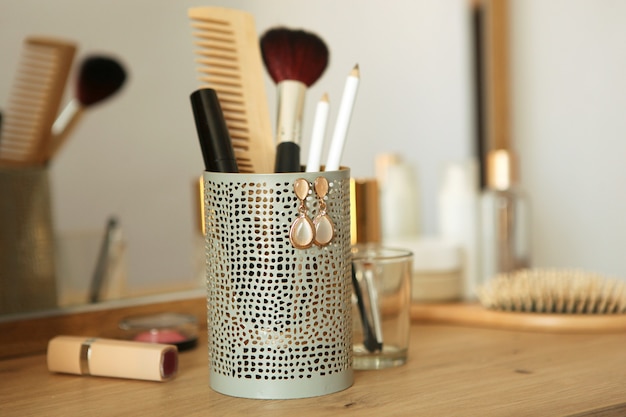 Decorative cosmetics for makeup on a dressing table closeup