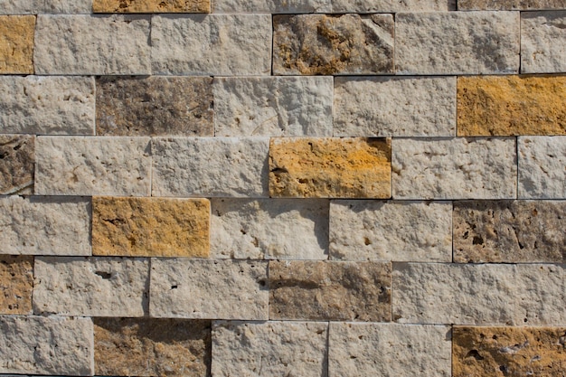 Premium Photo | Decorative cubic stone wall background