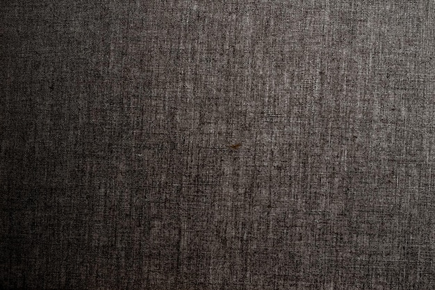 Decorative dark linen fabric textured background for interior furniture design and art canvas backdrop