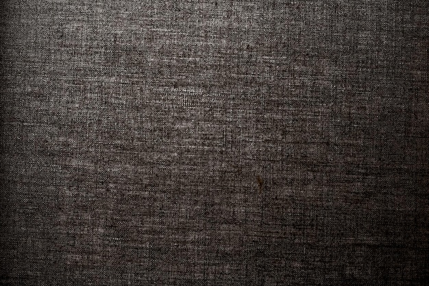 Decorative dark linen fabric textured background for interior furniture design and art canvas backdrop