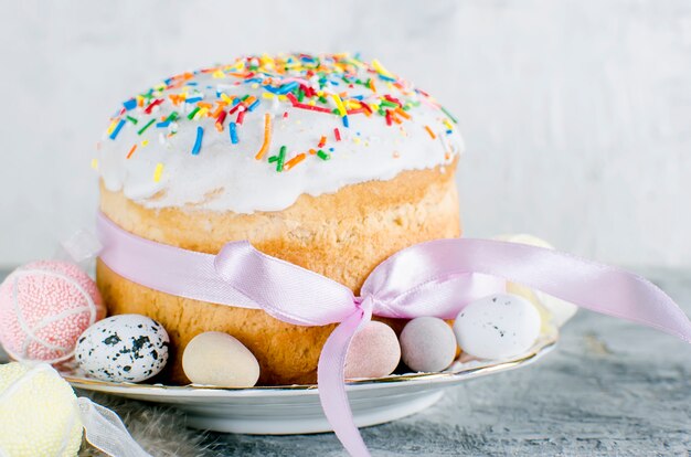 Decorative eggs sweets in the nest and Easter cake