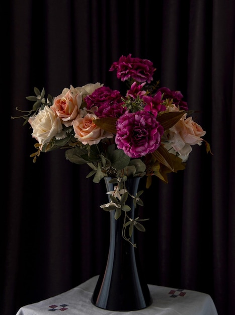 Decorative flowers in the black vase