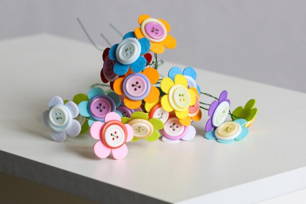 decorative flowers made of multicolored buttons