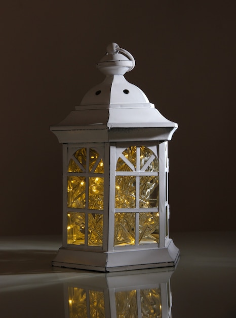 Decorative glowing lantern at night