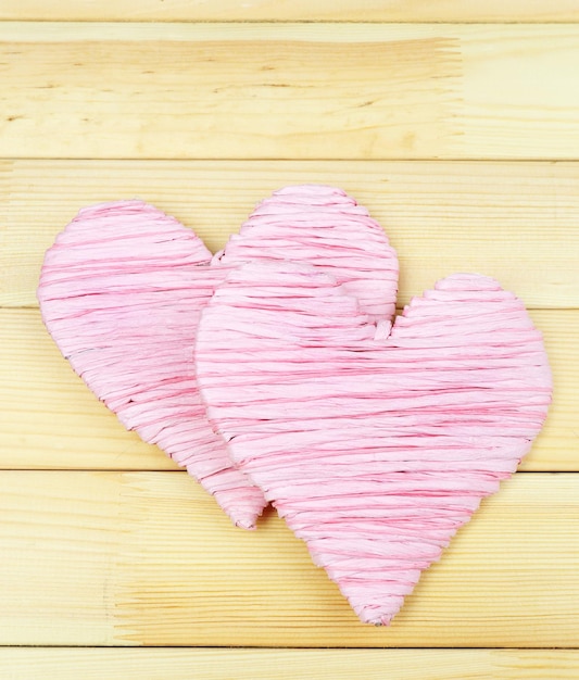 Decorative heart on wooden background