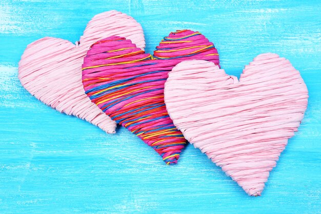 Decorative heart on wooden background