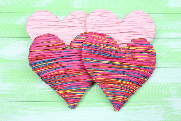 Decorative heart on wooden background