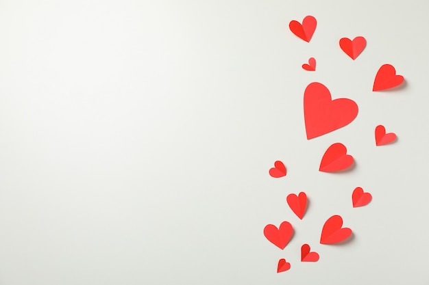 Decorative hearts on white background, space for text