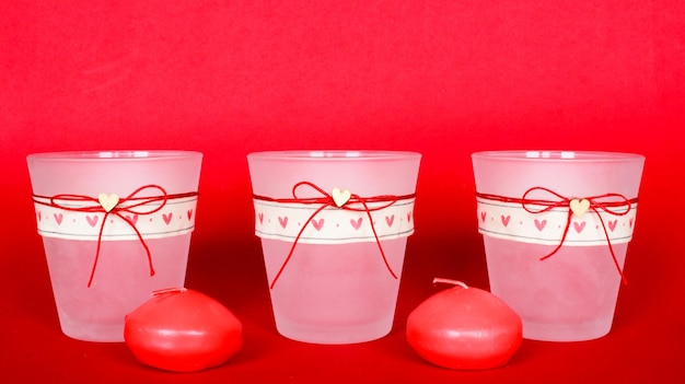 Decorative home objects Candle holders on the red background for home interior design