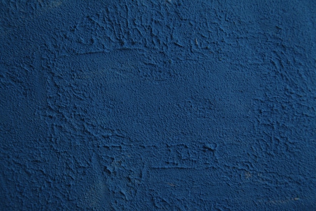 壁の装飾的なペイント美しい抽象的なグランジ装飾的なダークブルーの漆喰壁の背景