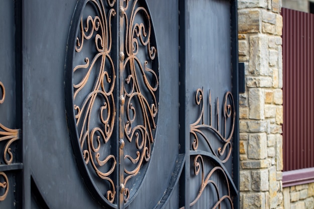 Decorative parts of metal gates, elements of hand forging.