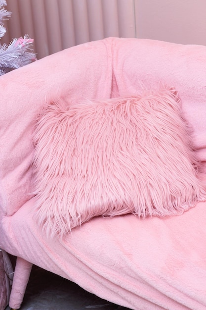 decorative pillows on the bed in the bedroom as decoration of the interior and decor