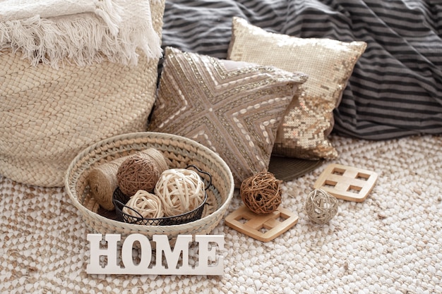 Photo decorative pillows and other home decor elements close up.