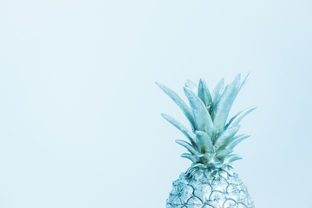 Decorative pineapple on blue