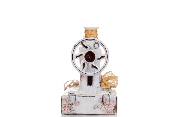 Decorative sewing machine on a white background