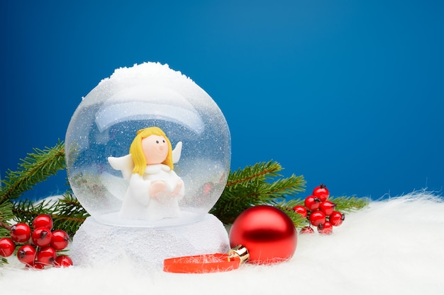 Decorative snow globe with angel inside