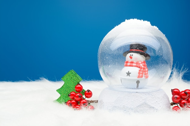 Decorative snow globe with snowman inside