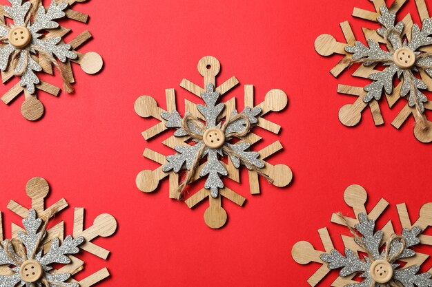 Decorative snowflakes on red table