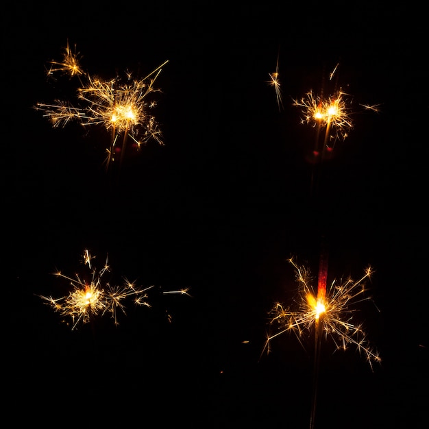 Foto sparklers decorativi su sfondo nero