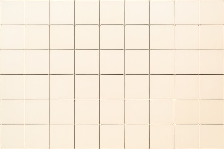 Photo 建物のファサードにある装飾的な正方形のベージュのタイル
