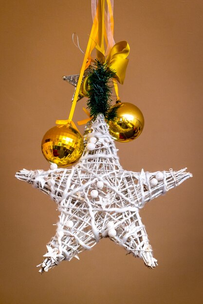 Decorative star and gold balls decorate the room for Christmas and New Year_