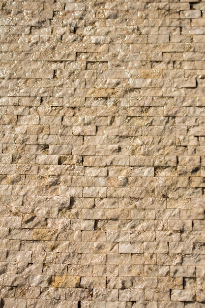 Decorative stone background built of little stones