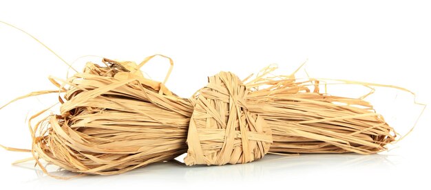 Decorative straw for hand made and heart of straw, isolated on white