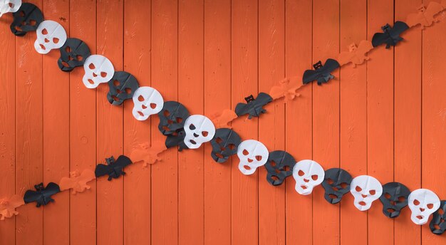 写真 装飾的な木製のハロウィーンオレンジ色の背景