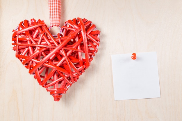 Decorative wooden heart with empty label