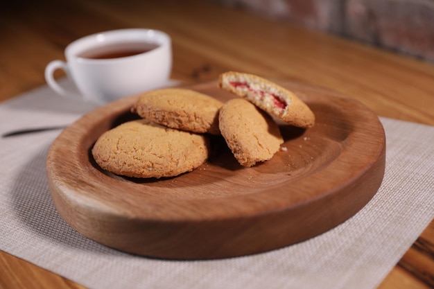 a decorative wooden plate is very beautiful for vegetables and cookies sweets and desserts