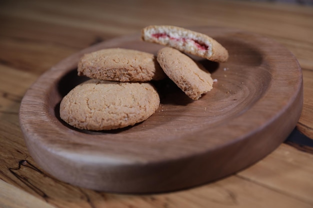 a decorative wooden plate is very beautiful for vegetables and cookies sweets and desserts