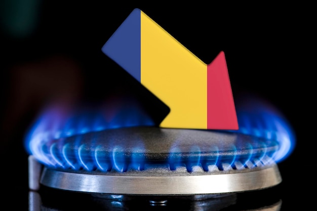 Decreased gas supplies in romania a gas stove with a burning flame and an arrow in the colors of the