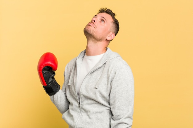 Dedicated and energetic, a Caucasian man practicing boxing is investing in his physical health and c