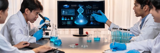 dedicated scientist group working on advance biotechnology computer software to study or analyze dna data after making scientific breakthrough from chemical experiment on medical laboratory neoteric