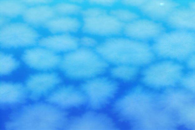Foto deeltjes van azuurblauwe kleurstof in water